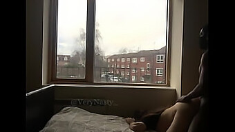 A Naughty Wife Gets Penetrated By A Bbc By The Window For All To View