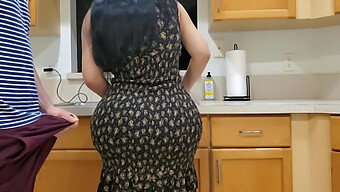 Amateur Stepmom Seduces Stepson In The Kitchen After Spotting His Erection