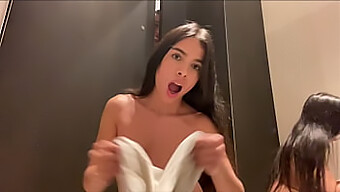 Young Brunette Gets Caught Squirting While Trying On Clothes In The Store